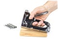Heavy duty staple gun with staples on the white background. Royalty Free Stock Photo