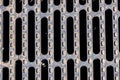 Heavy duty steel grating cover on sewer drain manhole