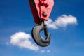 Heavy-duty steel hook on blue sky background Royalty Free Stock Photo