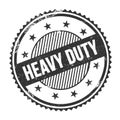 HEAVY DUTY text written on black grungy round stamp Royalty Free Stock Photo