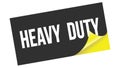 HEAVY  DUTY text on black yellow sticker stamp Royalty Free Stock Photo