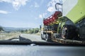 Heavy-duty truck carrying harvester