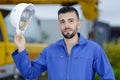 heavy equipment operator removing hardhat Royalty Free Stock Photo