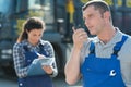 heavy equipment operator using walkie talkie Royalty Free Stock Photo