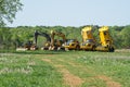 Heavy equipment truck lined up in the field Royalty Free Stock Photo