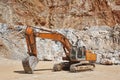 Heavy excavator on a quarry. Excavation machinery. Earthmover work