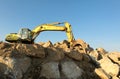 Heavy excavator in a open pit mining. Bottom view. Royalty Free Stock Photo