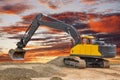 Heavy excavator working at construction site Royalty Free Stock Photo