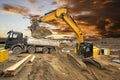 Heavy excavator working on construction site Royalty Free Stock Photo