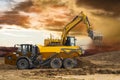 Heavy excavator working on construction site Royalty Free Stock Photo