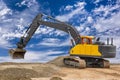 Heavy excavator working on construction site Royalty Free Stock Photo