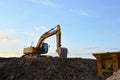 Heavy excavator working at construction site. Royalty Free Stock Photo