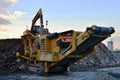 Heavy excavator working at construction site. Royalty Free Stock Photo