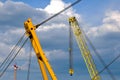 Heavy floating steel crane and boom. bridge construction closeup.