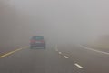 Heavy fog in the motorway. Danger. Royalty Free Stock Photo