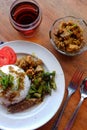 Heavy food photos include rice, peanuts, meat and tea