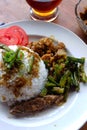 Heavy food photos include rice, peanuts, meat and tea