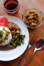 Heavy food photos include rice, peanuts, meat and tea