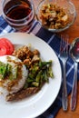 Heavy food photos include rice, peanuts, meat and tea