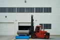 Heavy Forklift loader with concrete pipes Royalty Free Stock Photo