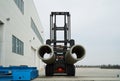 Heavy Forklift loader with concrete pipes Royalty Free Stock Photo