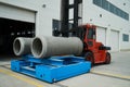 Heavy Forklift loader with concrete pipes