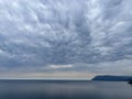 Heavy gray clouds over Baikal Lake, Russia