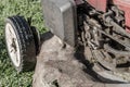 Petrol lawnmower seen before having its annual service. Royalty Free Stock Photo