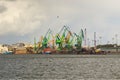 Heavy harbor jib cranes in the Klaipeda Sea Port. Royalty Free Stock Photo