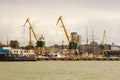 Heavy harbor jib cranes in the Klaipeda Sea Port. Royalty Free Stock Photo