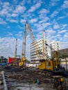 Heavy industrial machine tools for excavation, heavy material removal, building construction in the city center Royalty Free Stock Photo