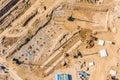 Heavy industrial machines working at construction site. aerial top view Royalty Free Stock Photo