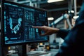 Heavy industry engineer managing machinery and automation system using futuristic computer software