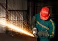 Heavy industry manual worker with grinder Royalty Free Stock Photo