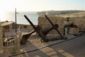 Valletta, Malta, August 2019. Anchors in a military museum on the background of the bay.