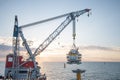 Heavy Lift Crane Vessel installing a topside on a monopile