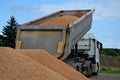 heavy load car. dump a load of gravel into a large pile. Royalty Free Stock Photo