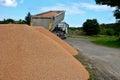 heavy load car. dump a load of gravel into a large pile. Royalty Free Stock Photo