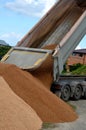 heavy load car. dump a load of gravel into a large pile. Royalty Free Stock Photo