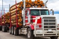 Heavy loaded timber transport truck in Canada