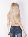 Heavy long platinum blonde hair in motion. Royalty Free Stock Photo