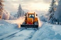 Heavy machinery clears winter road, ensuring safe travel conditions