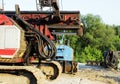 heavy machinery - Machine to hammer the piles in the construction of road junction in Moscow.