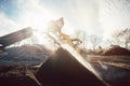 Heavy machinery moving earth and biomass in compost works Royalty Free Stock Photo