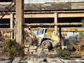 Heavy machinery works at the plant for the processing of reinforced concrete scrap. Royalty Free Stock Photo