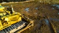 Heavy machines clearing the ground away in winter Royalty Free Stock Photo