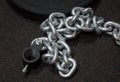 Heavy metal chain for strength training on the floor Royalty Free Stock Photo