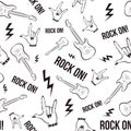 Heavy metal and grunge  seamless pattern with hands and electric guitars. Repetitive rock and roll background Royalty Free Stock Photo