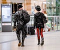 Heavy Metal guys fans, metalheads walk at the railway station. Gothic Leipzig annual festival