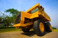 Heavy mining truck in mine and driving along the opencast. Photo of the big mine truck, The career heavy-load super car Royalty Free Stock Photo